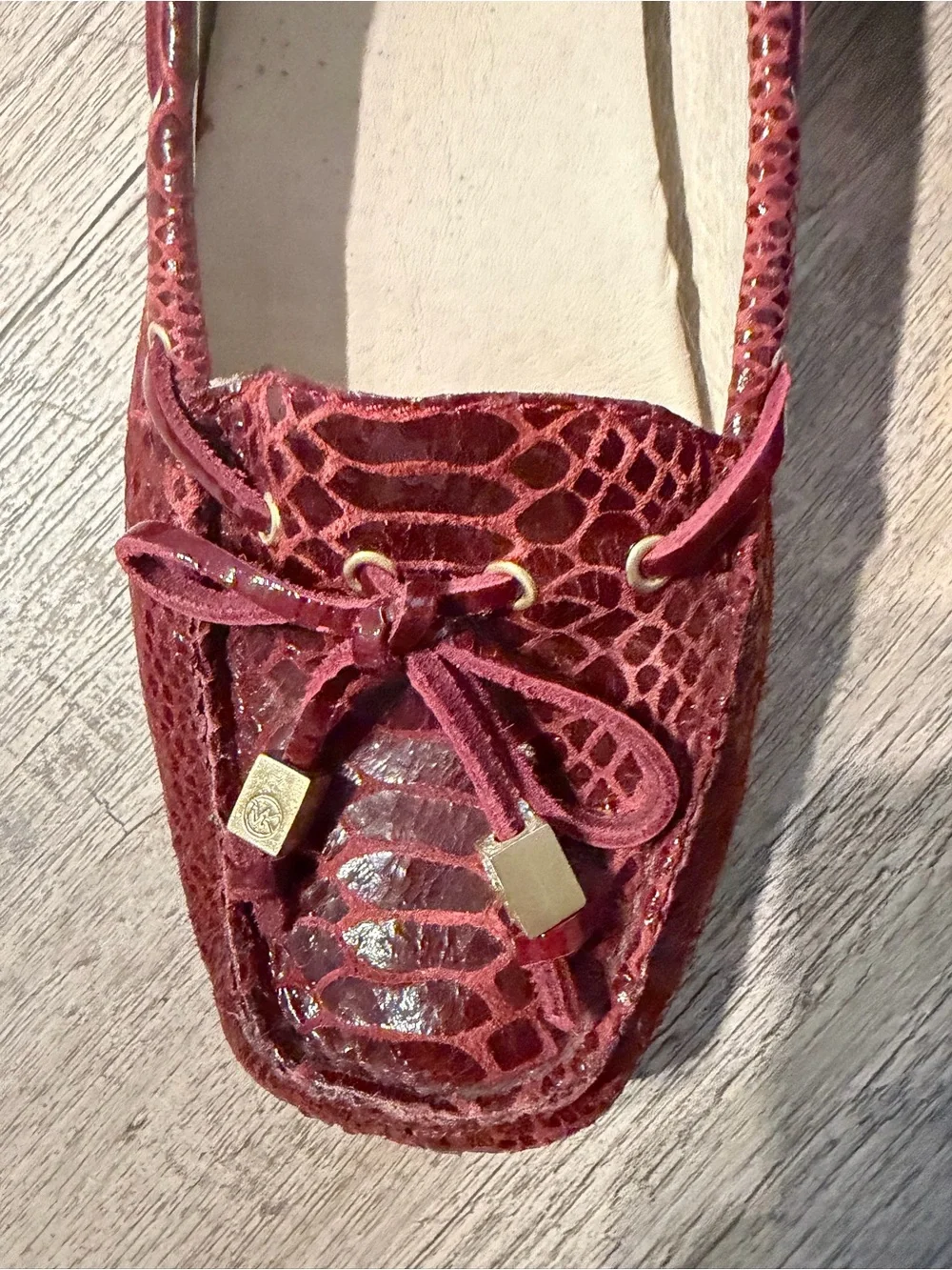 Michael Kors Burgundy Snake-Embossed Moccasin Flats with Gold Accents
